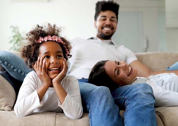 Happy family on couch