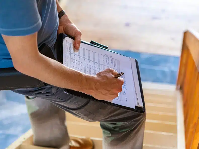 person holding clipboard