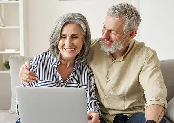 couple looking at computer